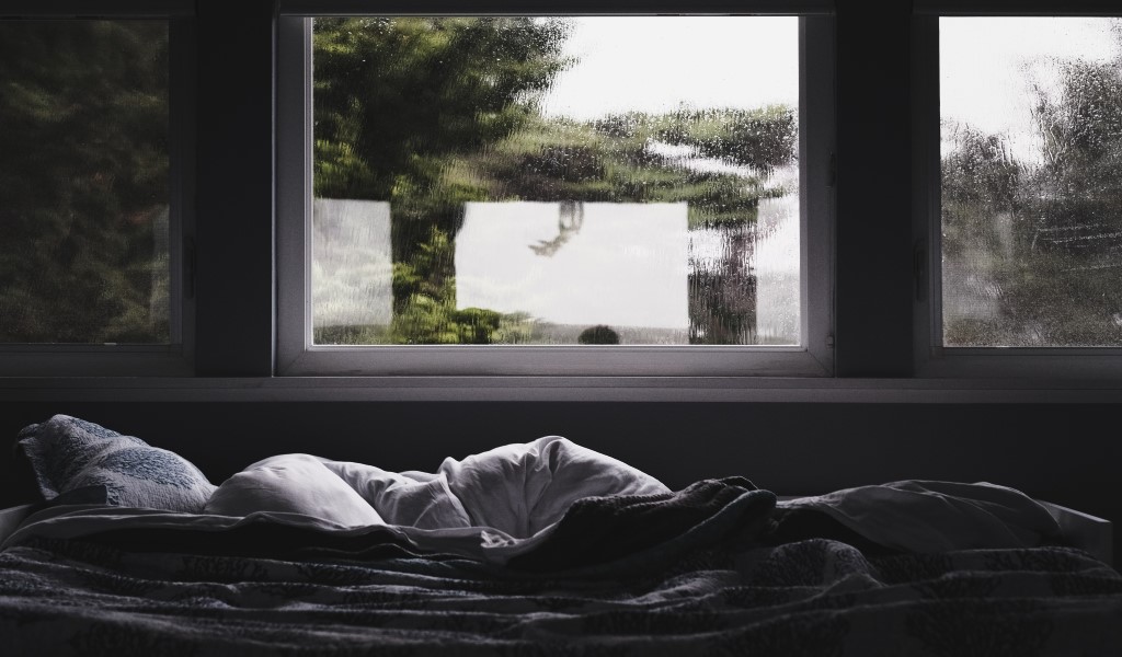 Ventana como cabecero de la cama